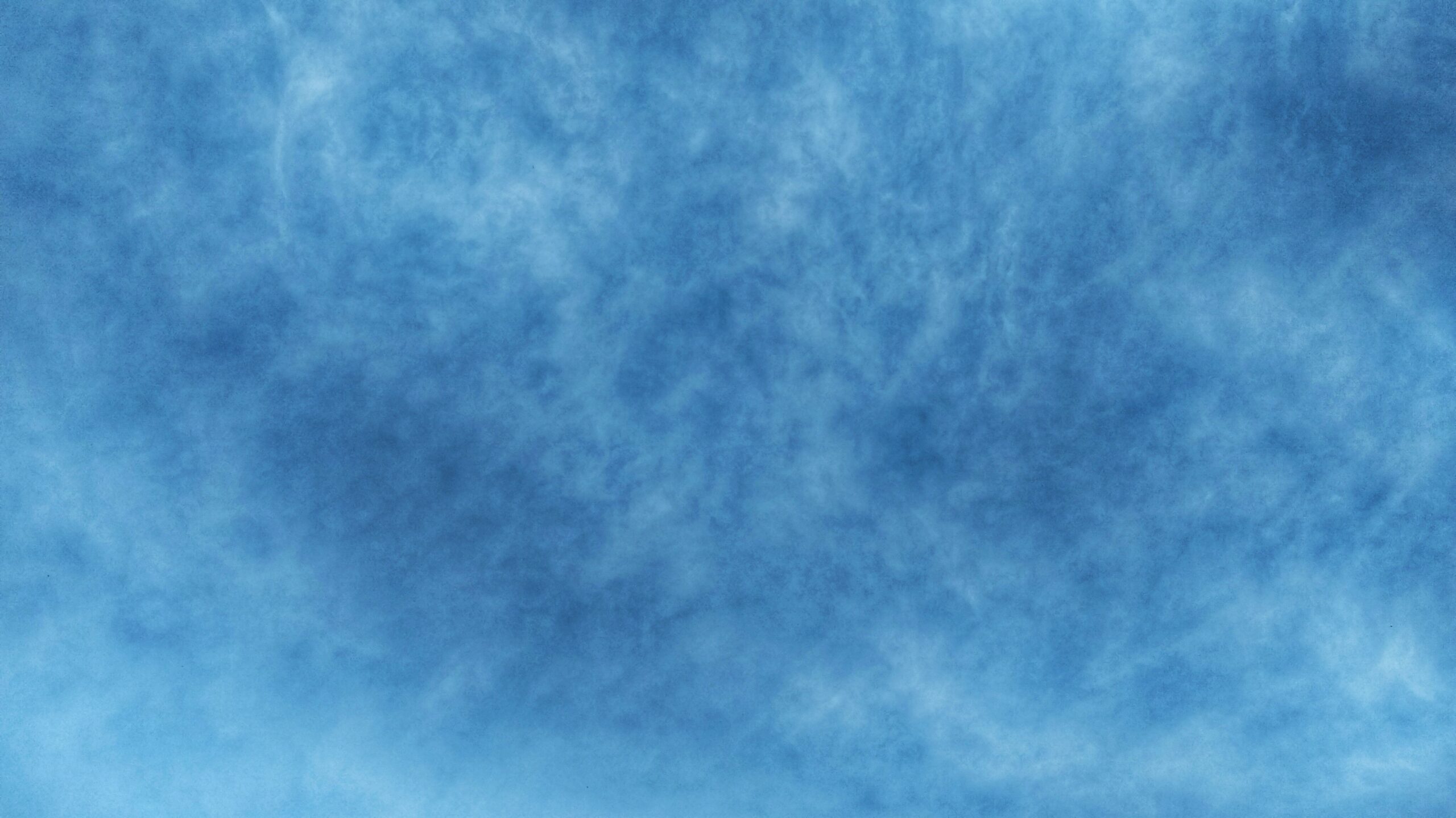 Vibrant blue sky with cirrus clouds